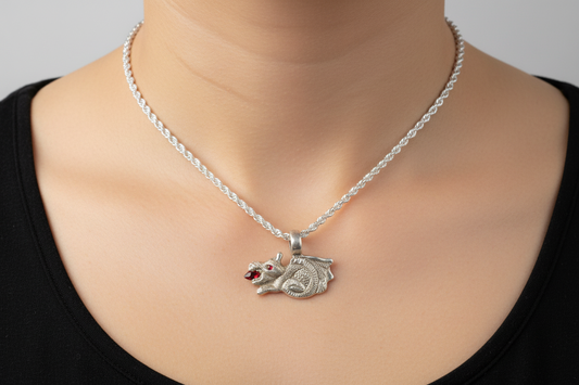 First Flame – Hand-Carved Silver Dragon Pendant with Garnet Flame & Ruby Eyes