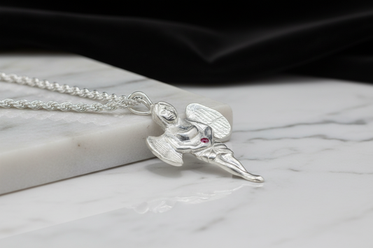 Nomadic Angel — Ruby & Hand-Carved 925 Silver Pendant