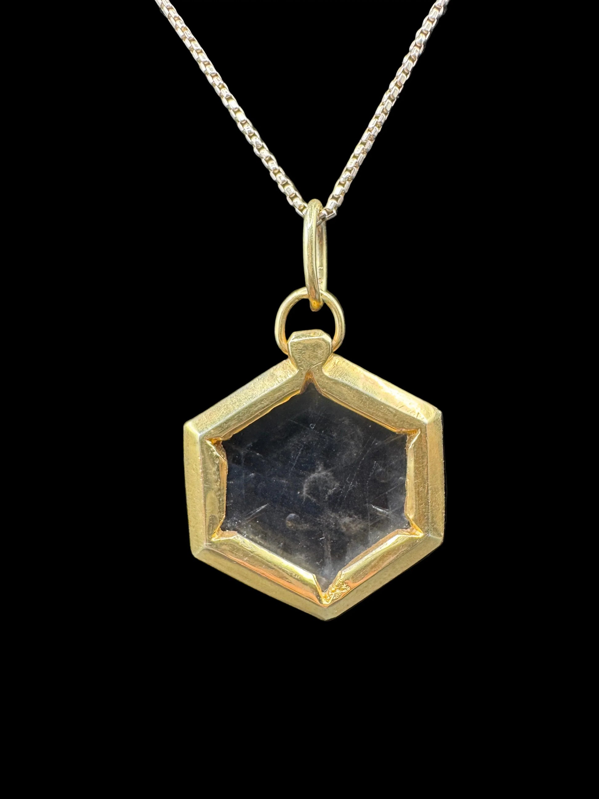 Hexagon clear crystal pendant with gold setting on silver chain, fine handcrafted jewelry