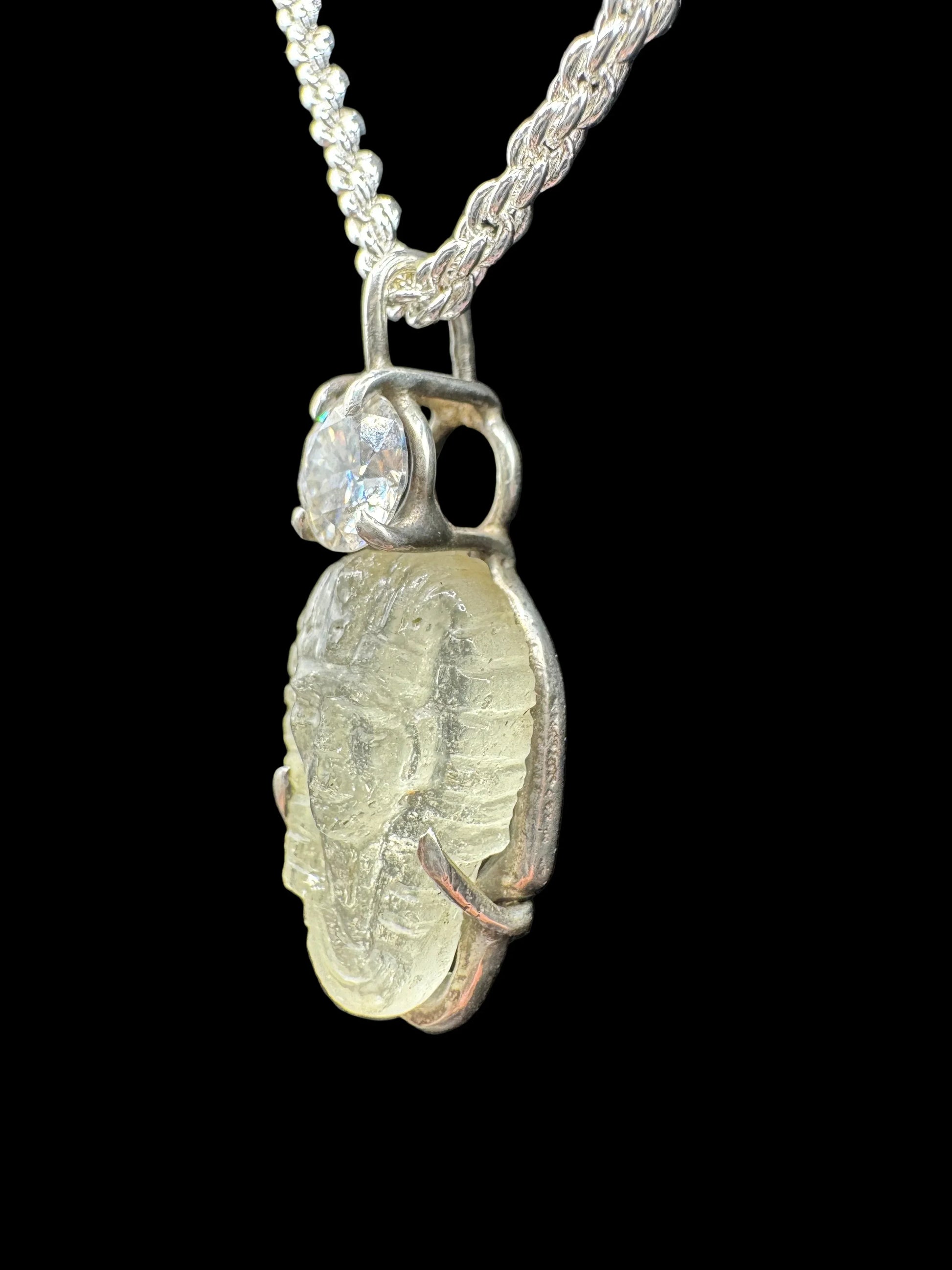 Handcrafted silver necklace with clear crystal pharaoh pendant and round gemstone accent
