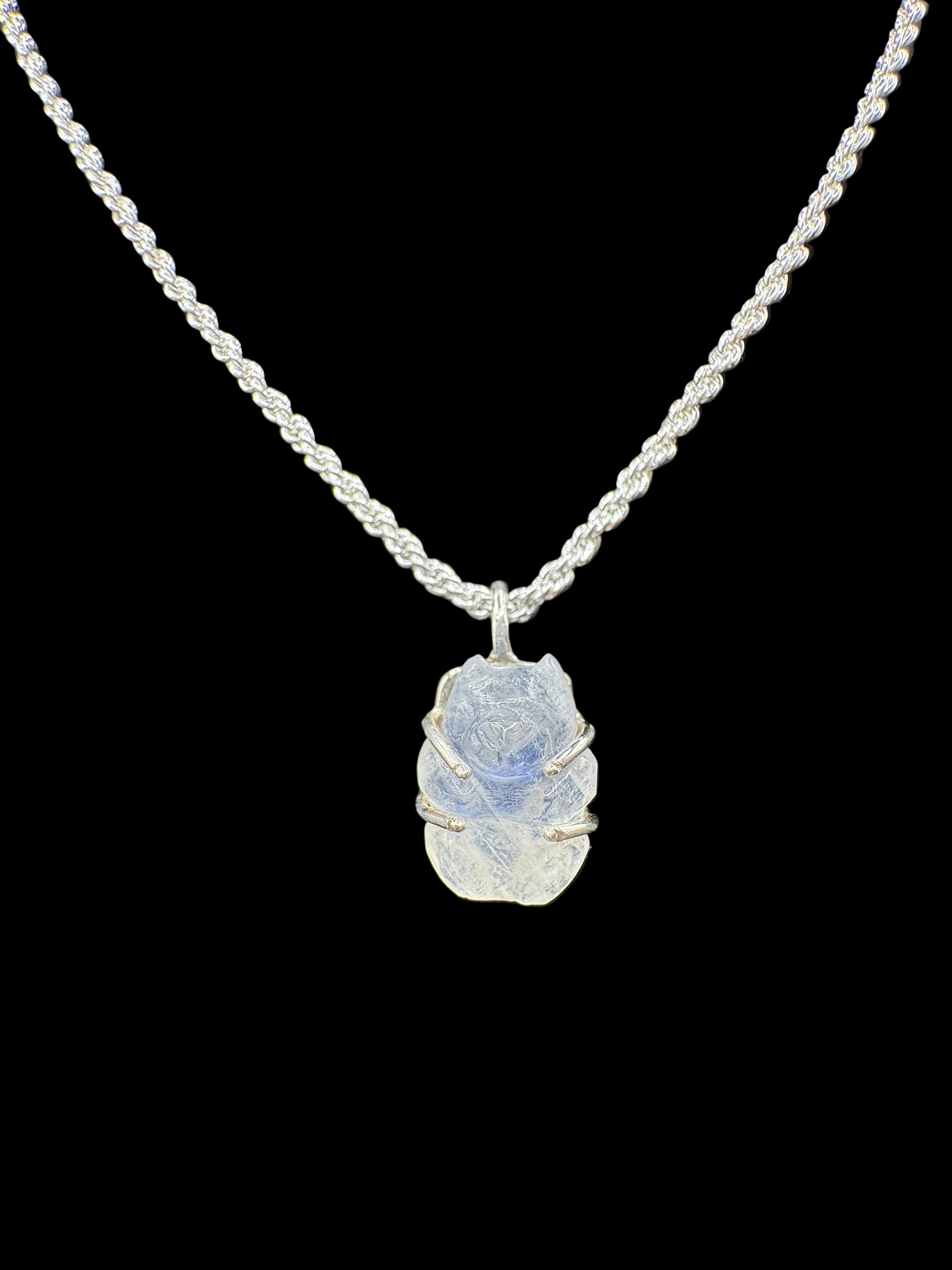 Necklace with a MOONSTONE BEAR pendant on a black background