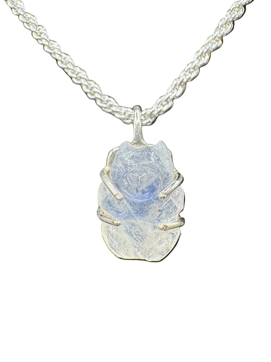 Necklace with a MOONSTONE BEAR pendant on a black background